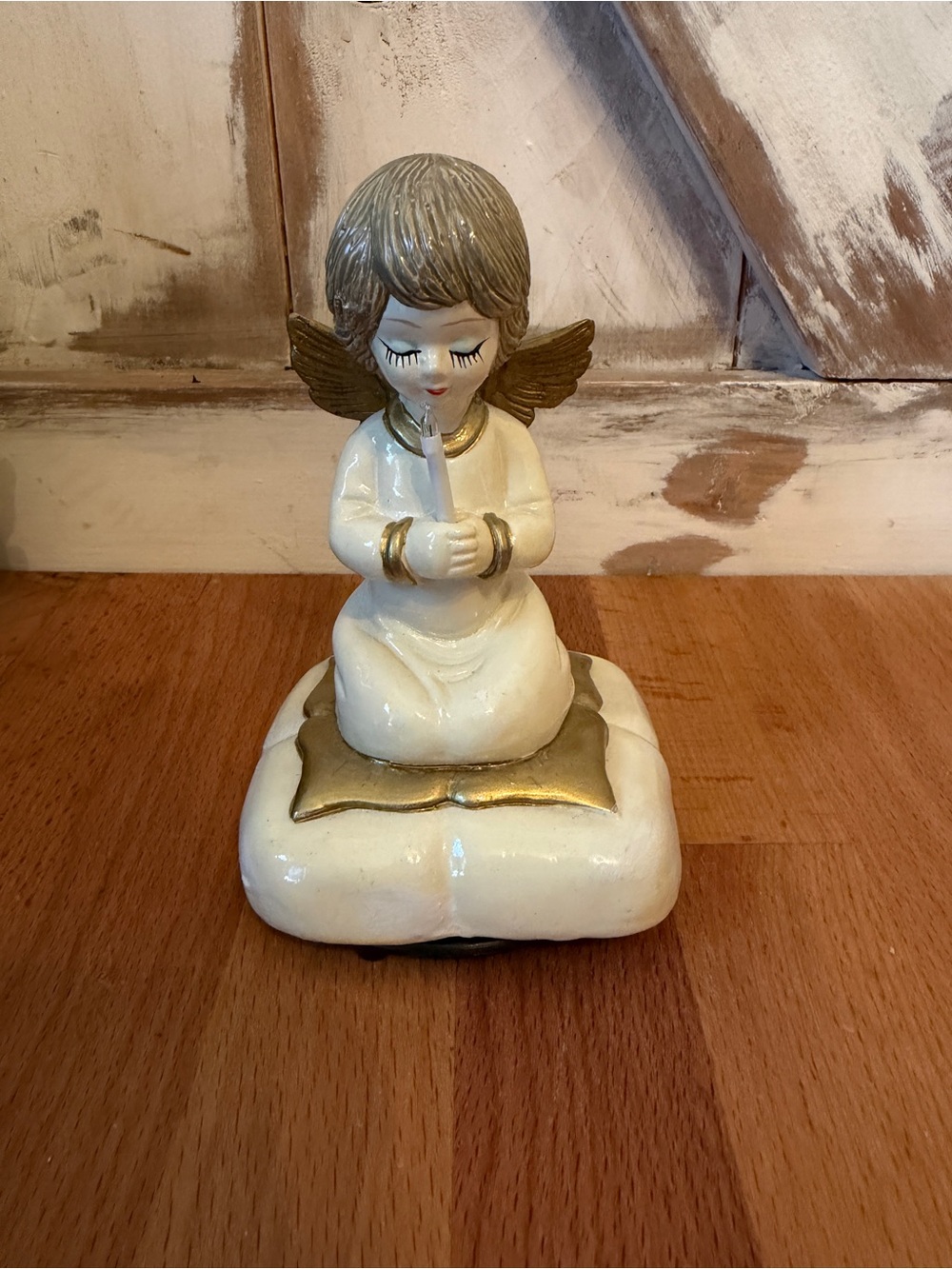 Vintage kneeling angel